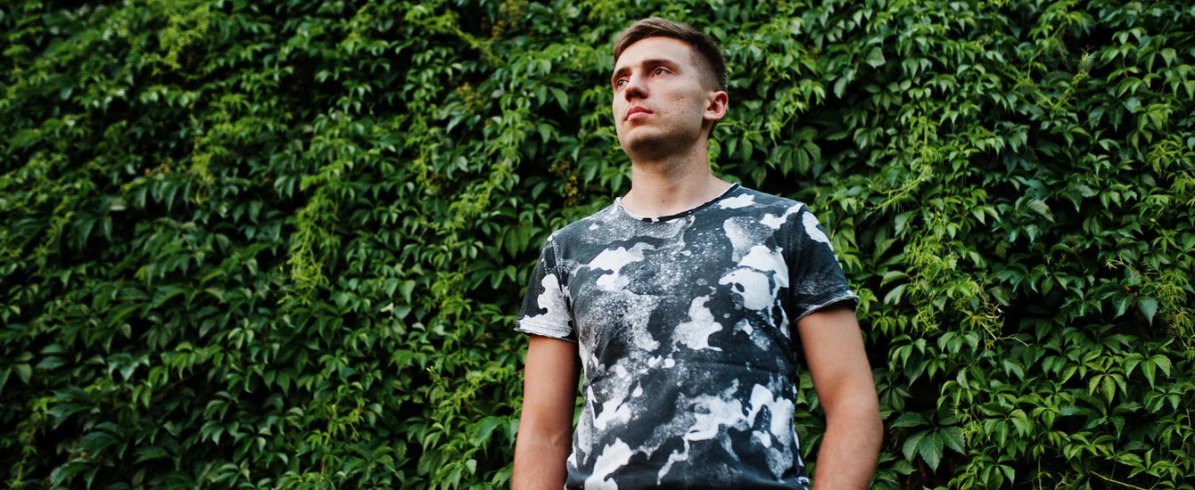 An image of a man wearing a shirt with a unique pattern - build your perfect shirt today with Pearce Bespoke.