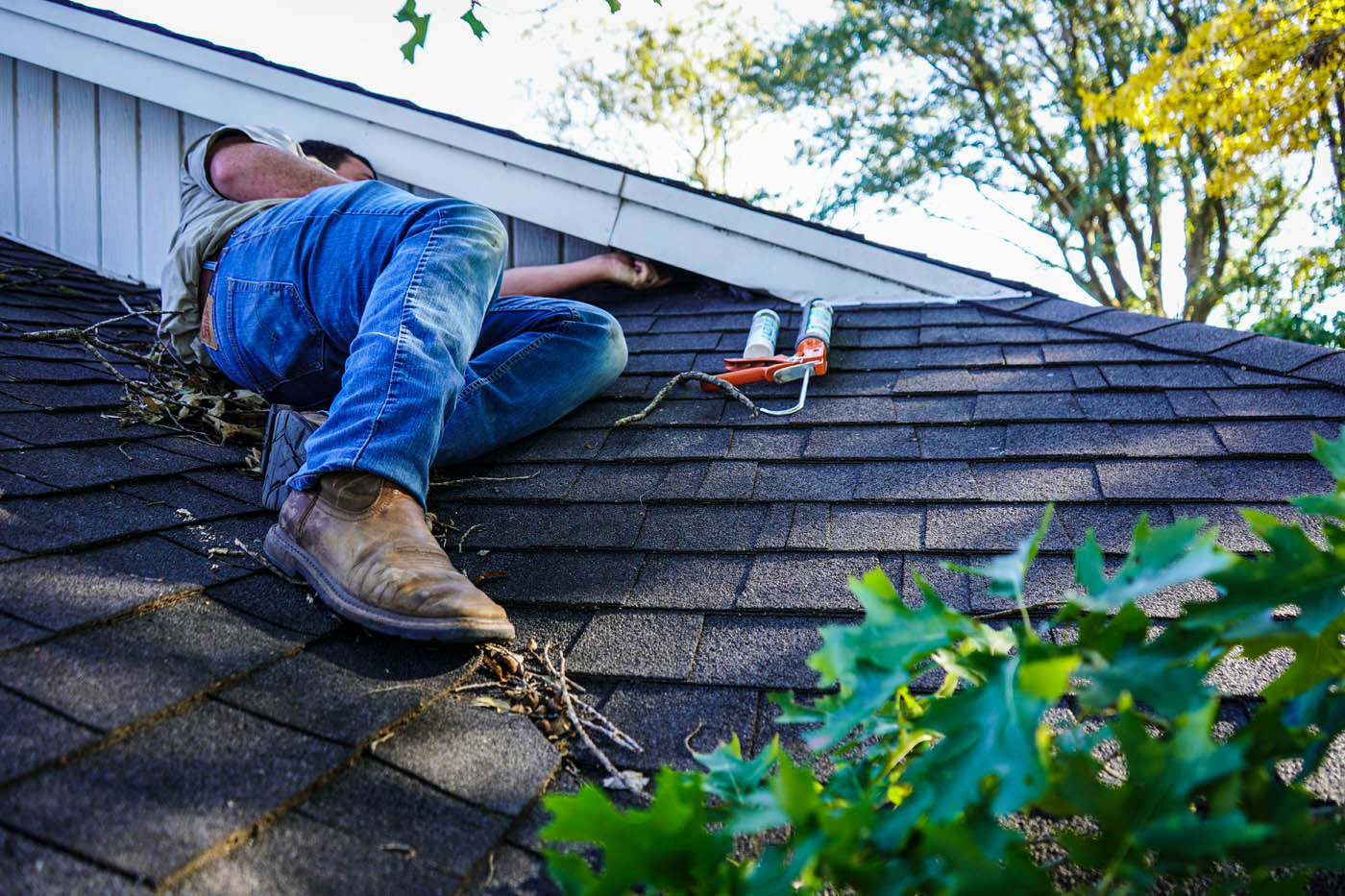 A GGA Pest Management Killeen technician inspecting a roof for termites.