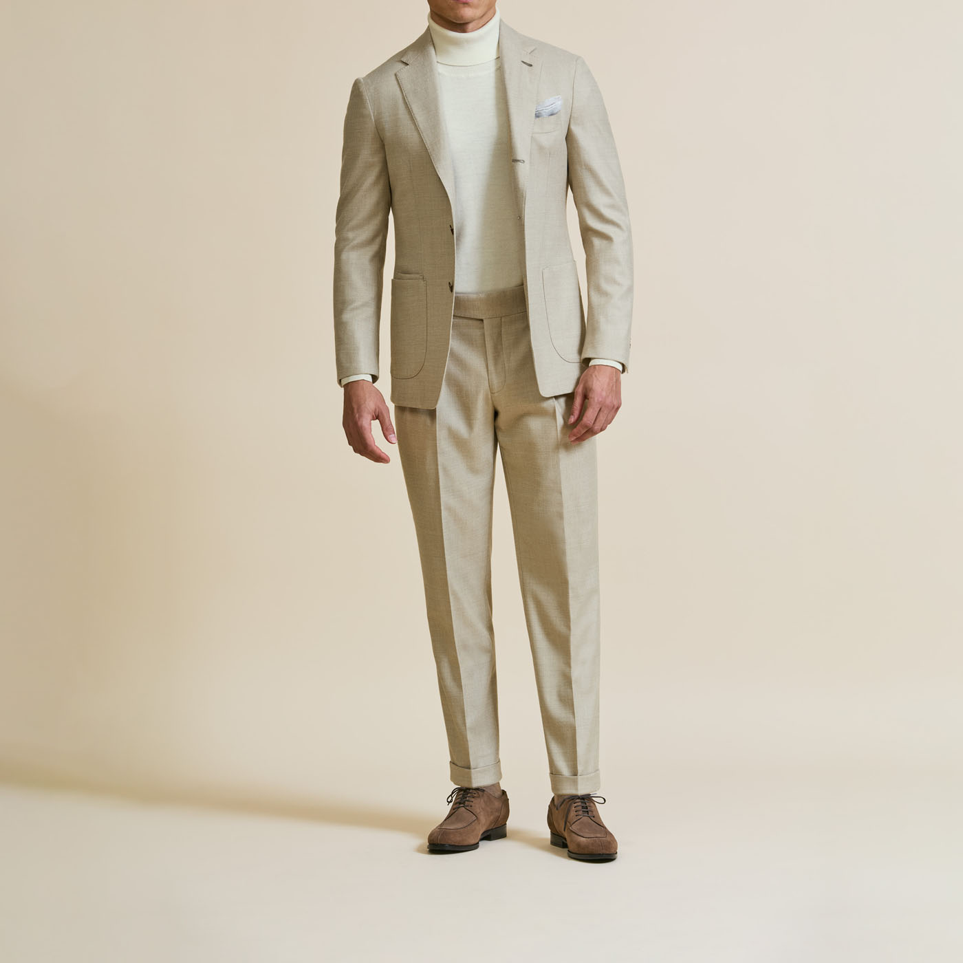A Pearce Bespoke custom suit on a male model.