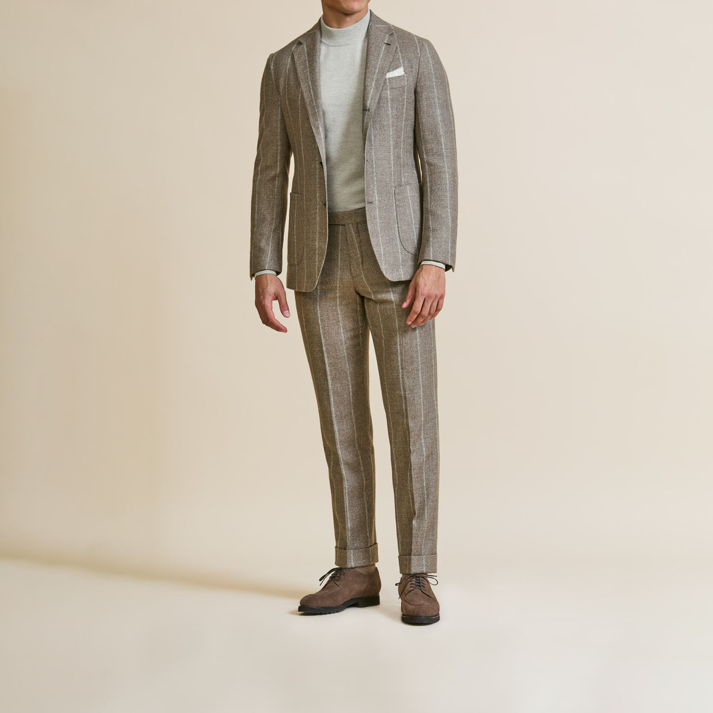 A Pearce Bespoke custom suit on a male model.