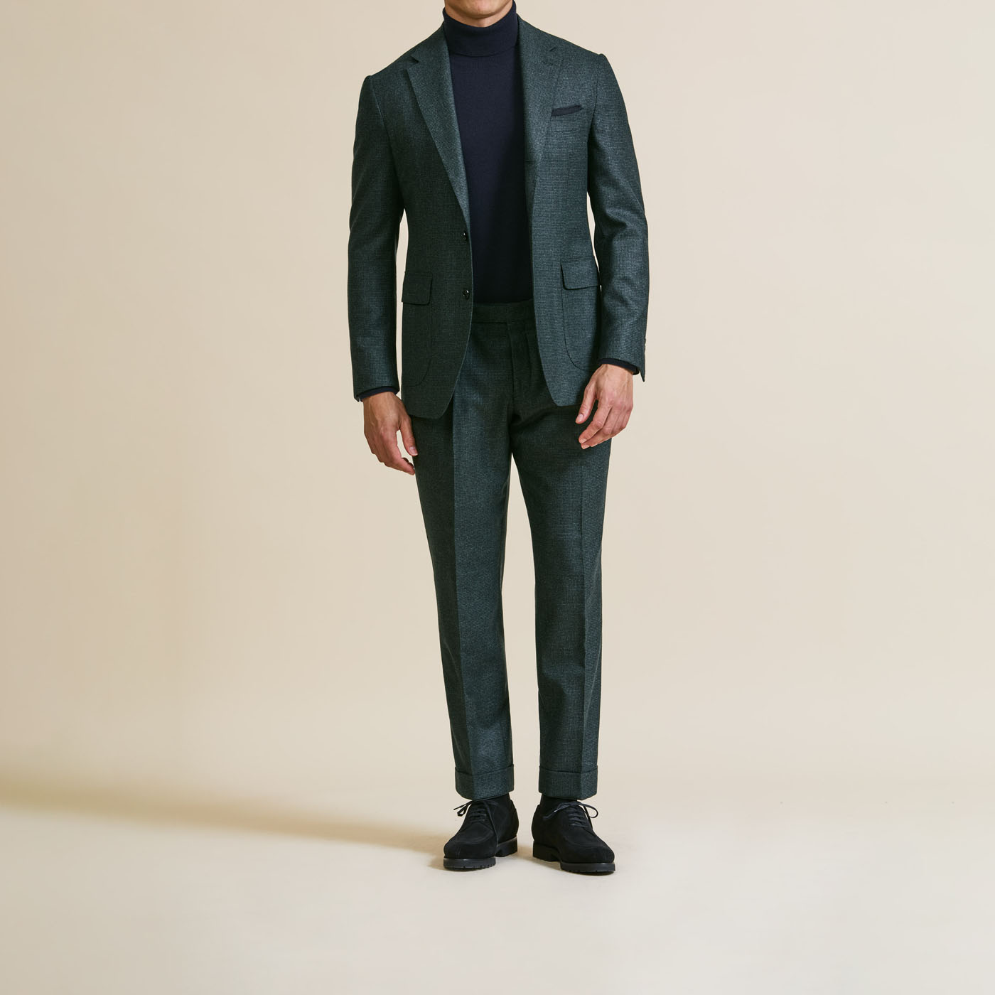 A Pearce Bespoke custom suit on a male model.