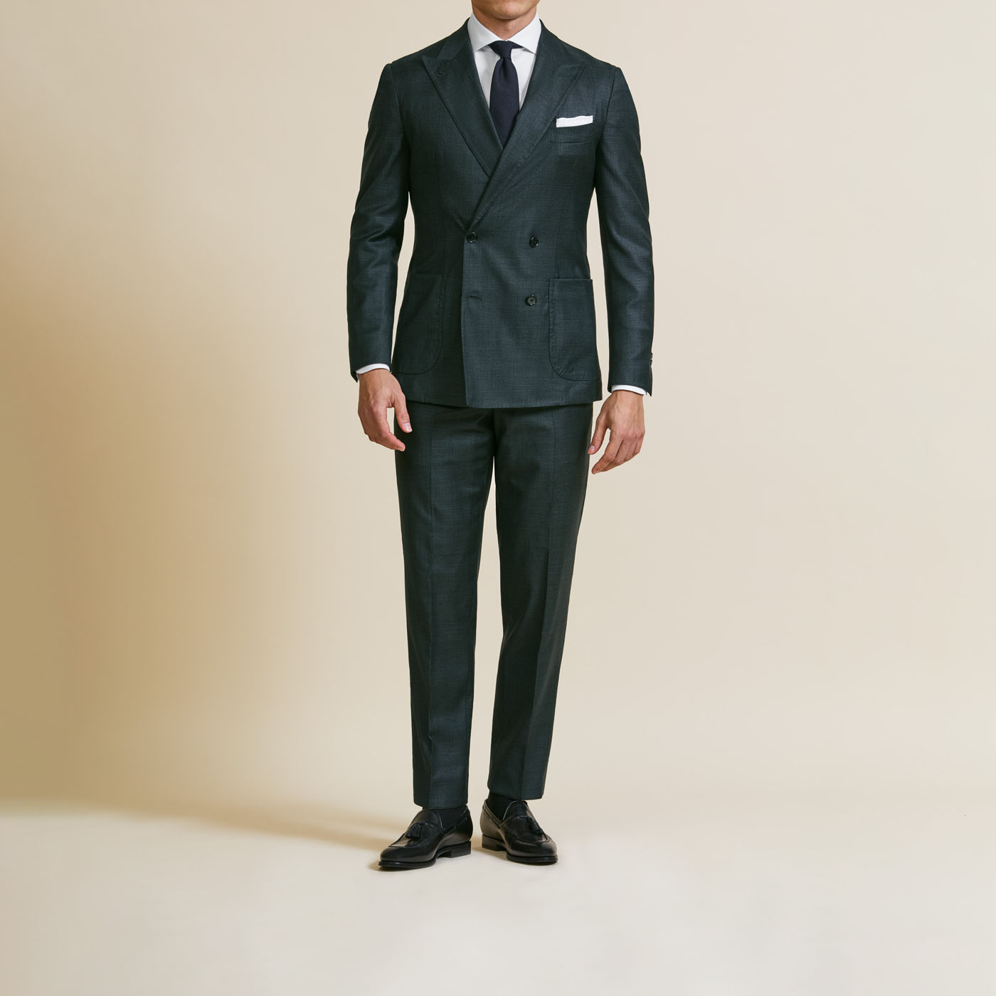 A Pearce Bespoke custom suit on a male model.