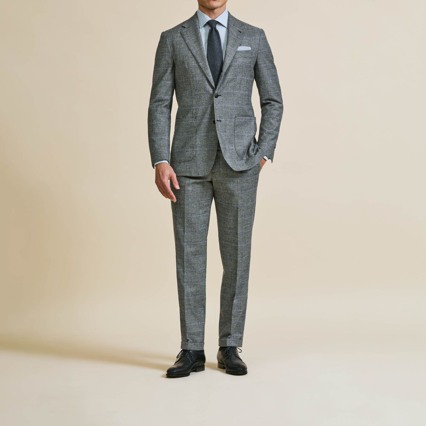 A Pearce Bespoke custom suit on a male model.