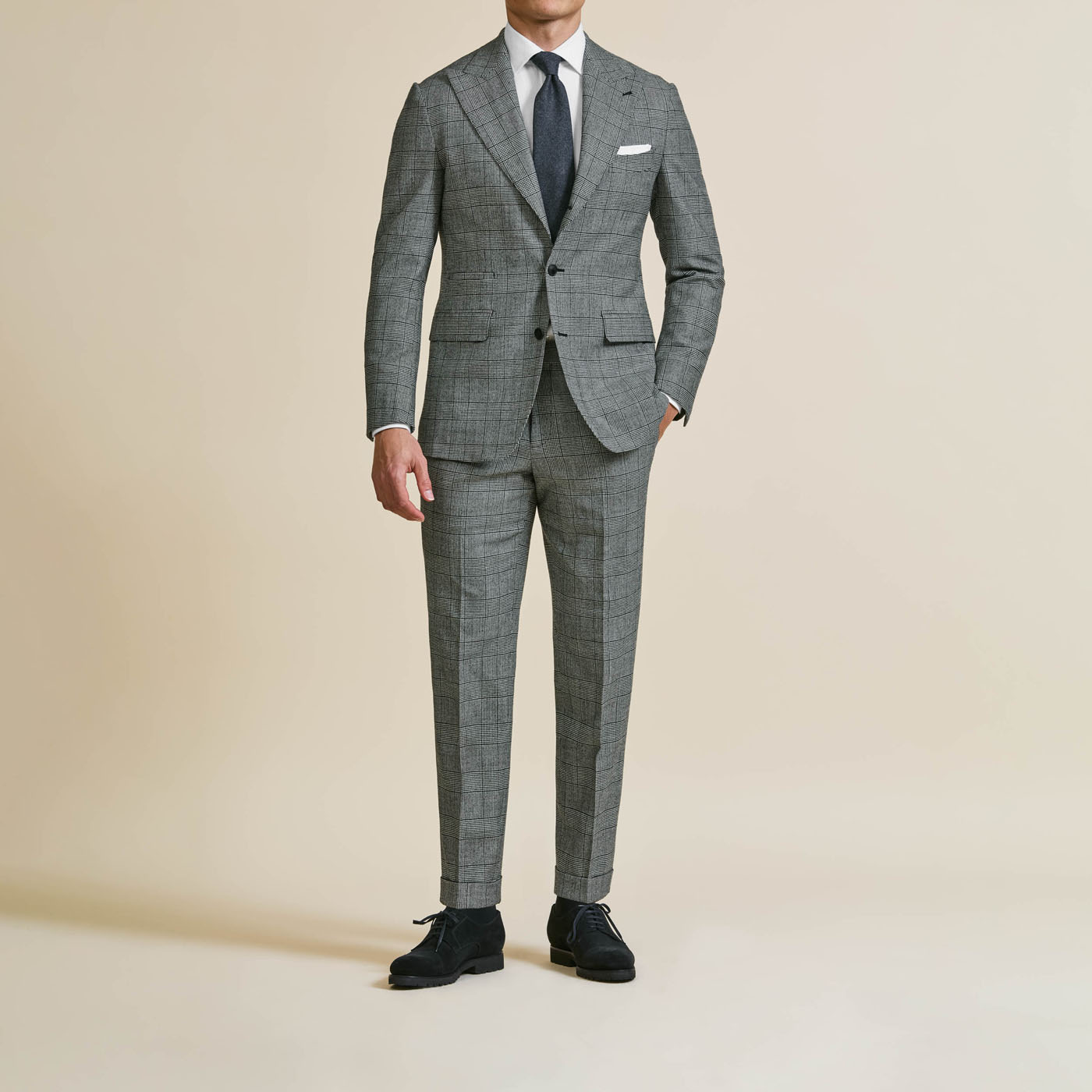 A Pearce Bespoke custom suit on a male model.