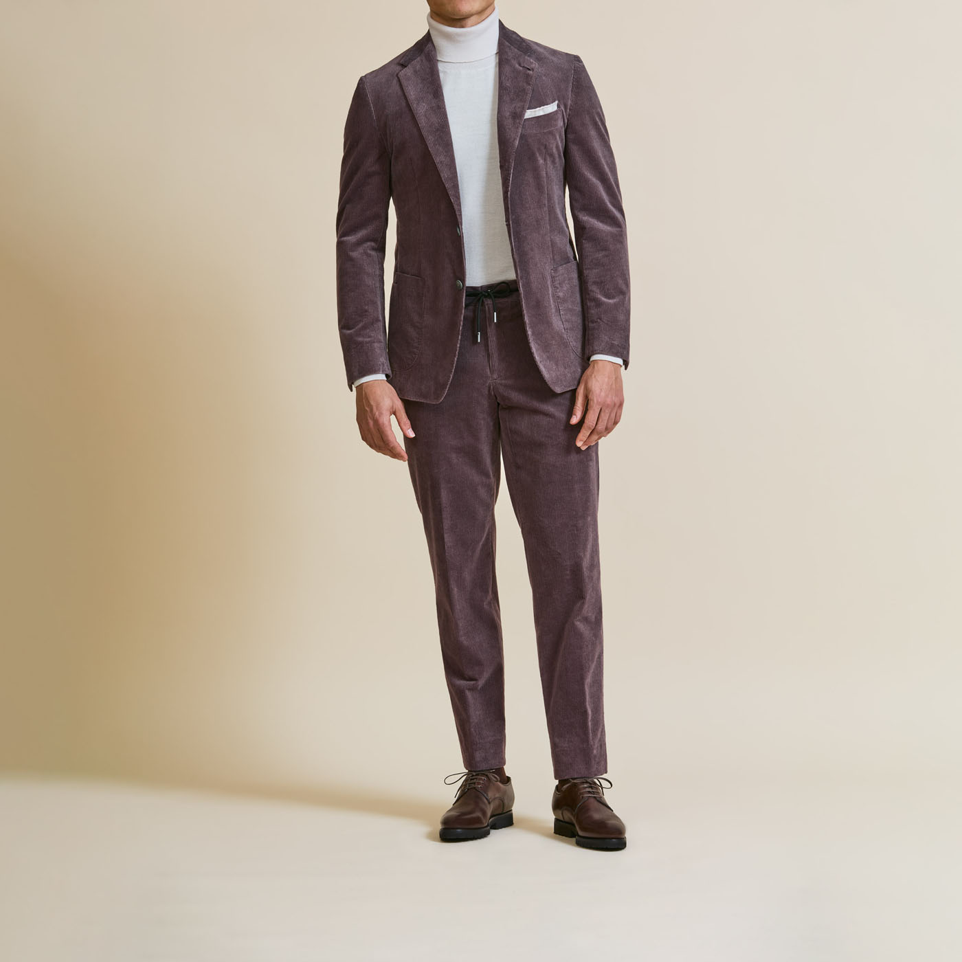 A Pearce Bespoke custom suit on a male model.