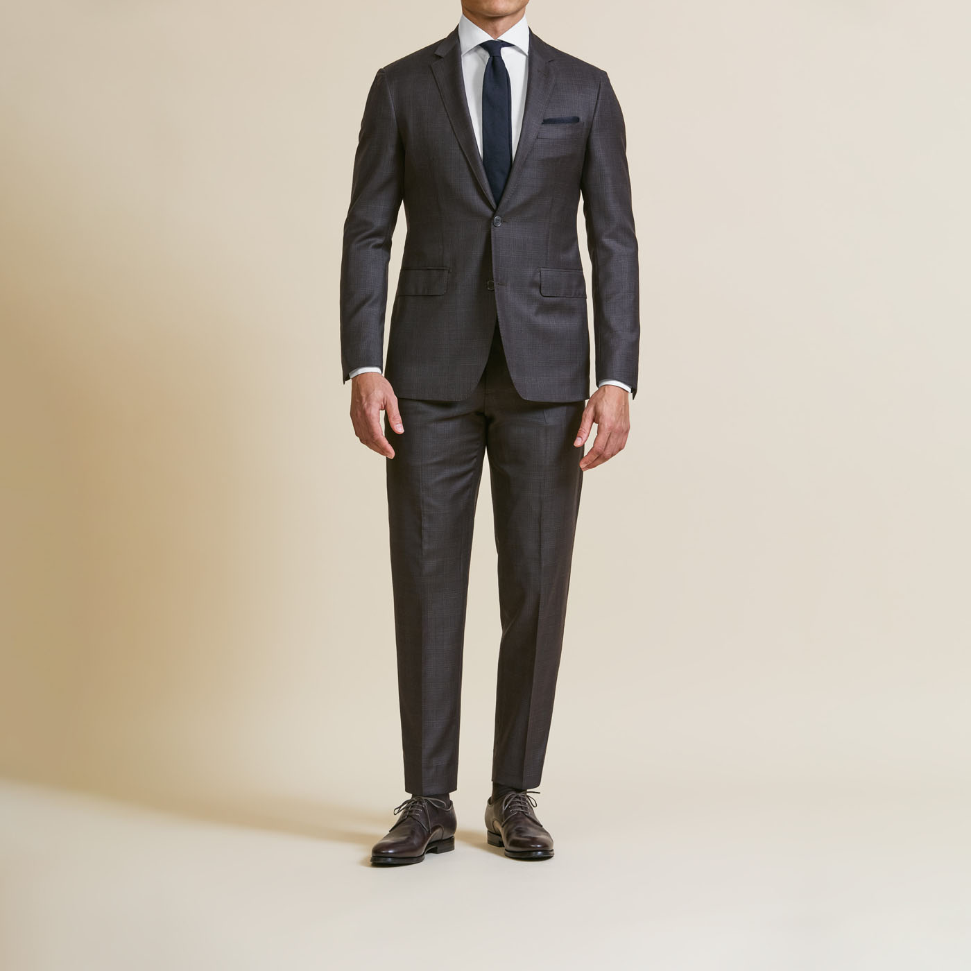 A Pearce Bespoke custom suit on a male model.
