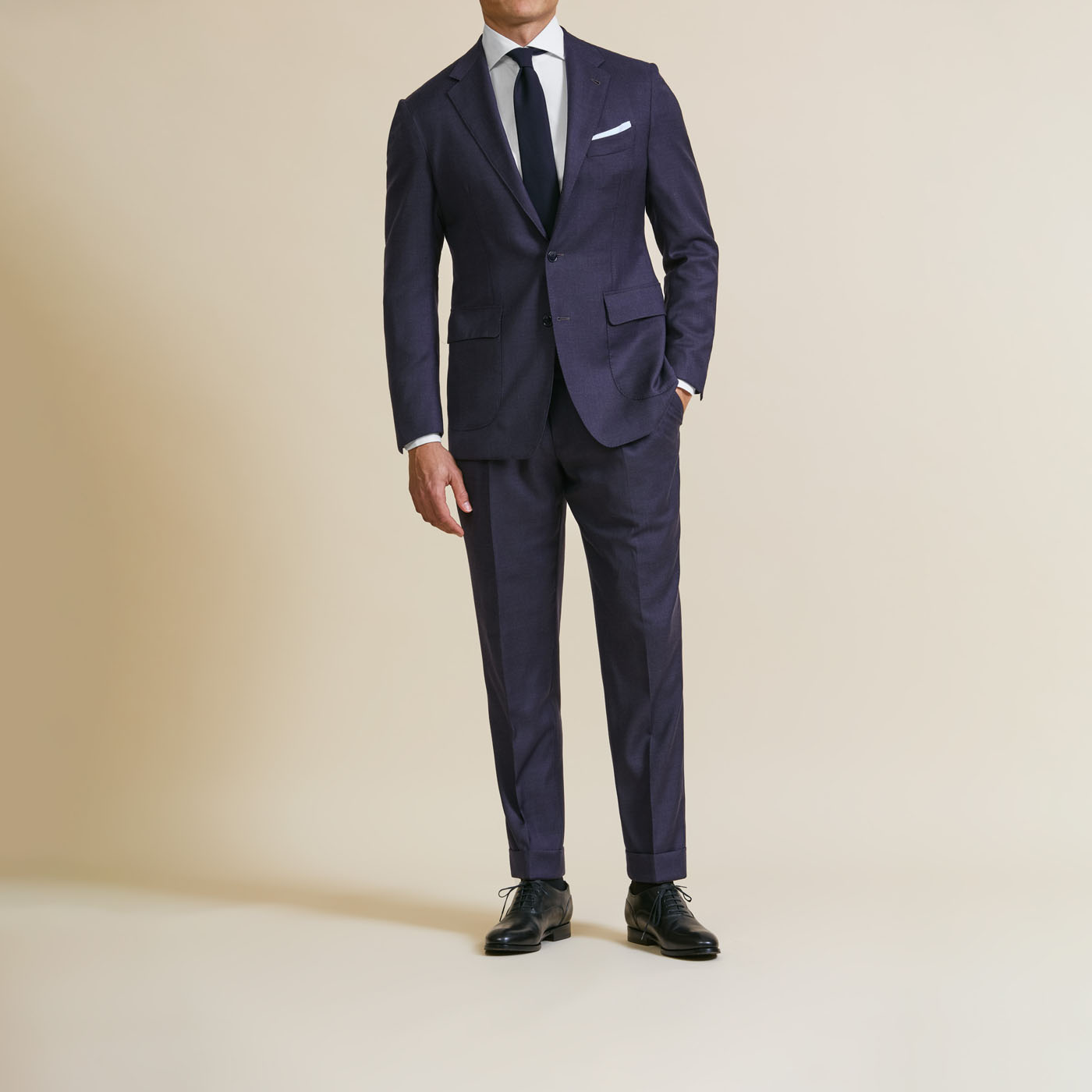 A Pearce Bespoke custom suit on a male model.