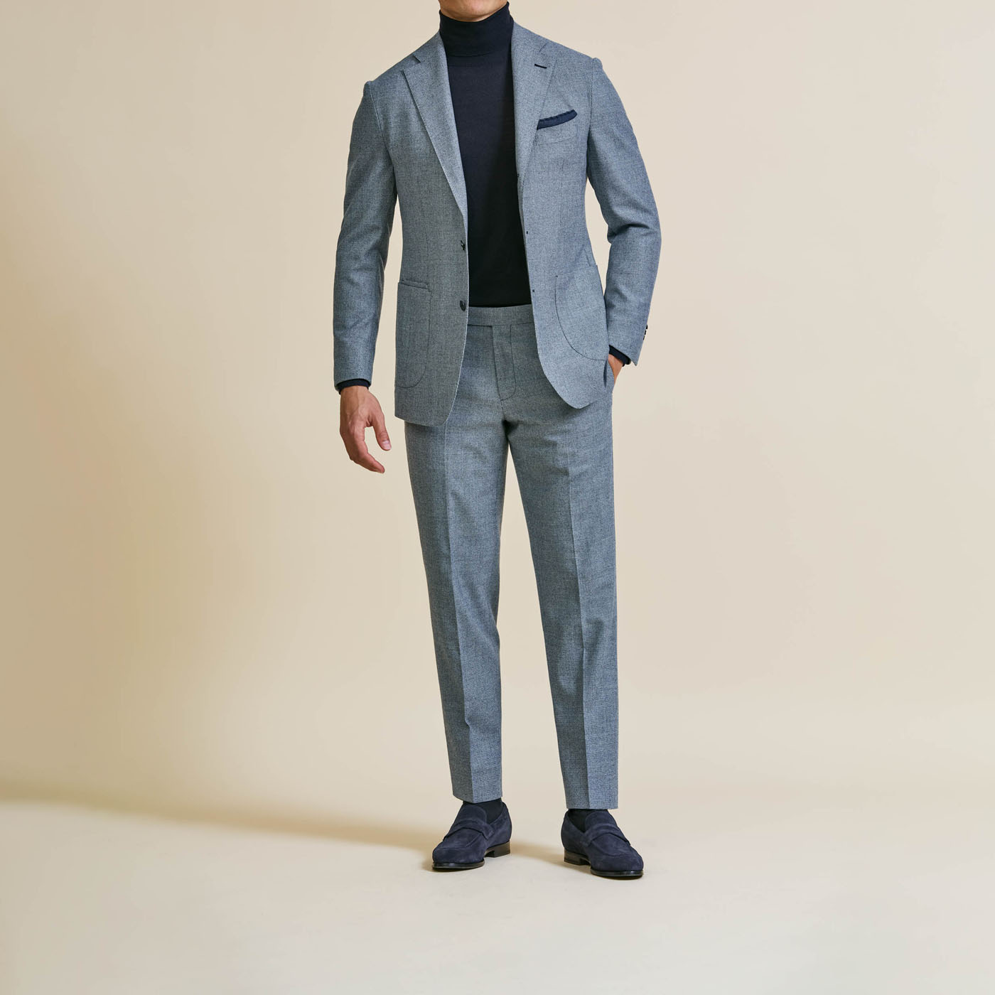 A Pearce Bespoke custom suit on a male model.