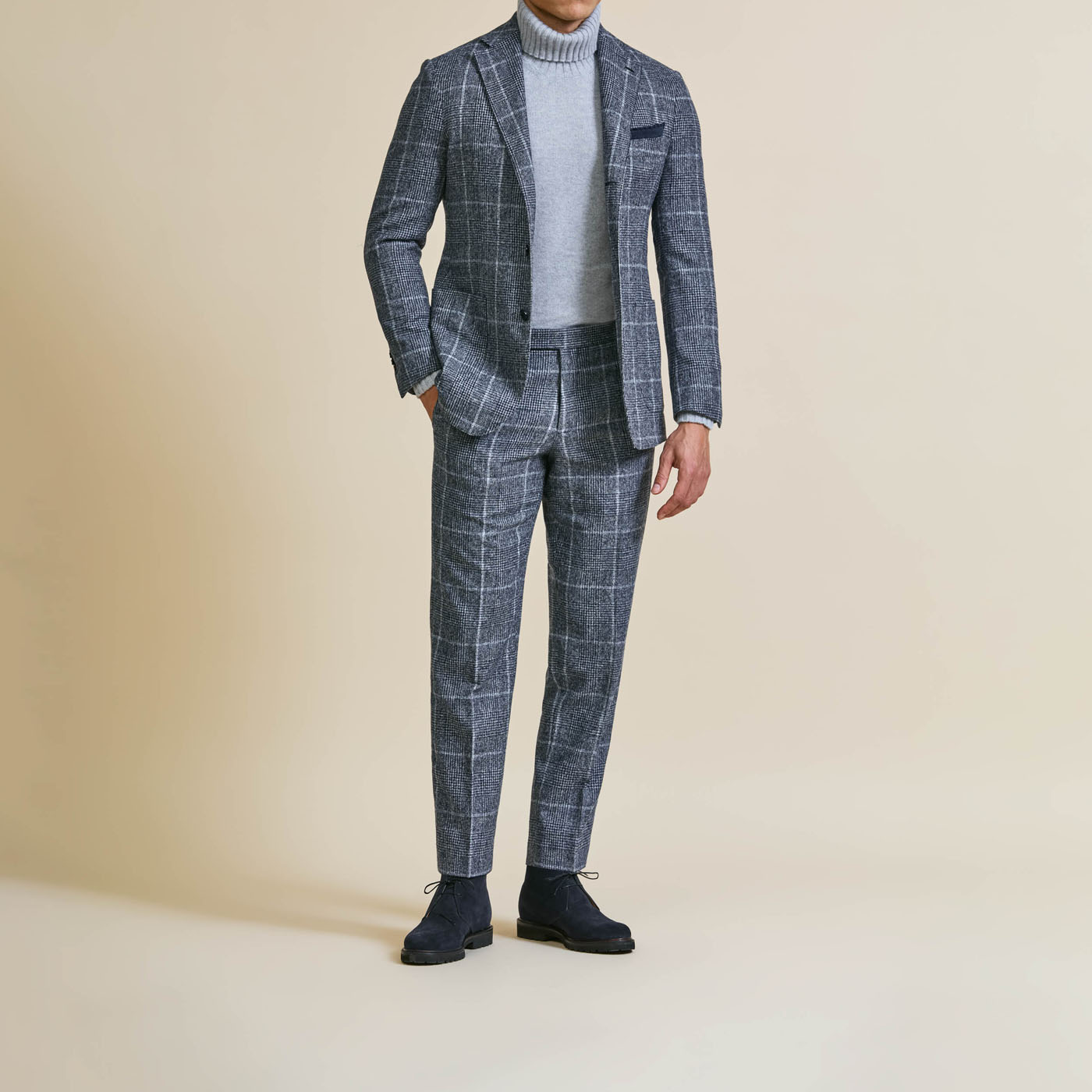 A Pearce Bespoke custom suit on a male model.