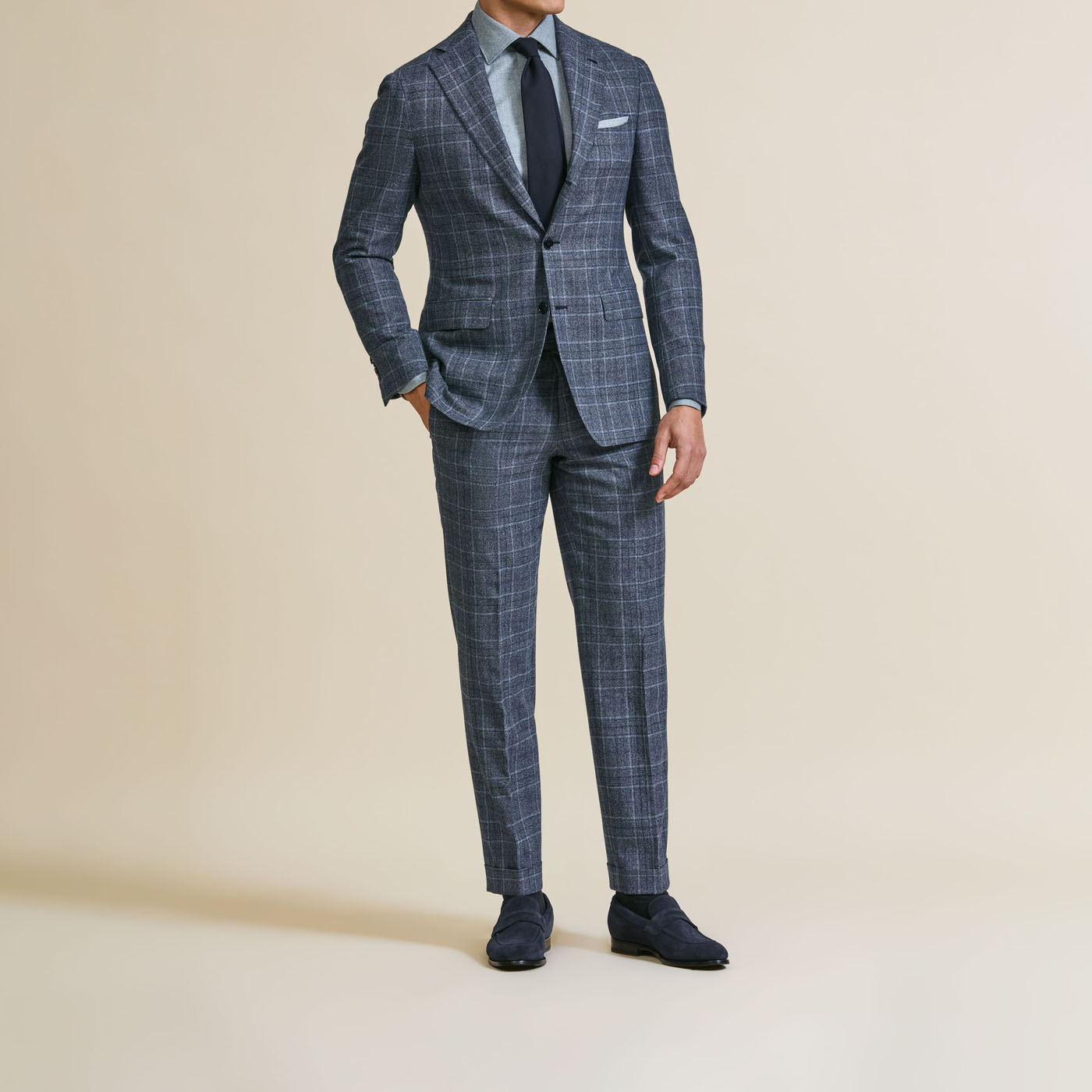 A Pearce Bespoke custom suit on a male model.