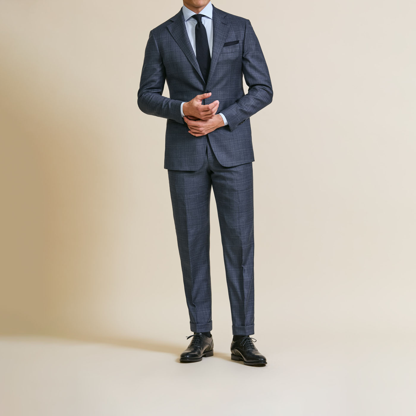 A Pearce Bespoke custom suit on a male model.
