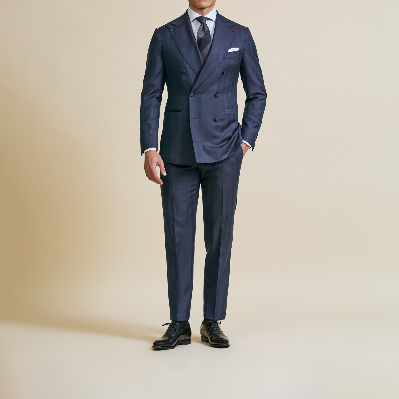 A Pearce Bespoke custom suit on a male model.