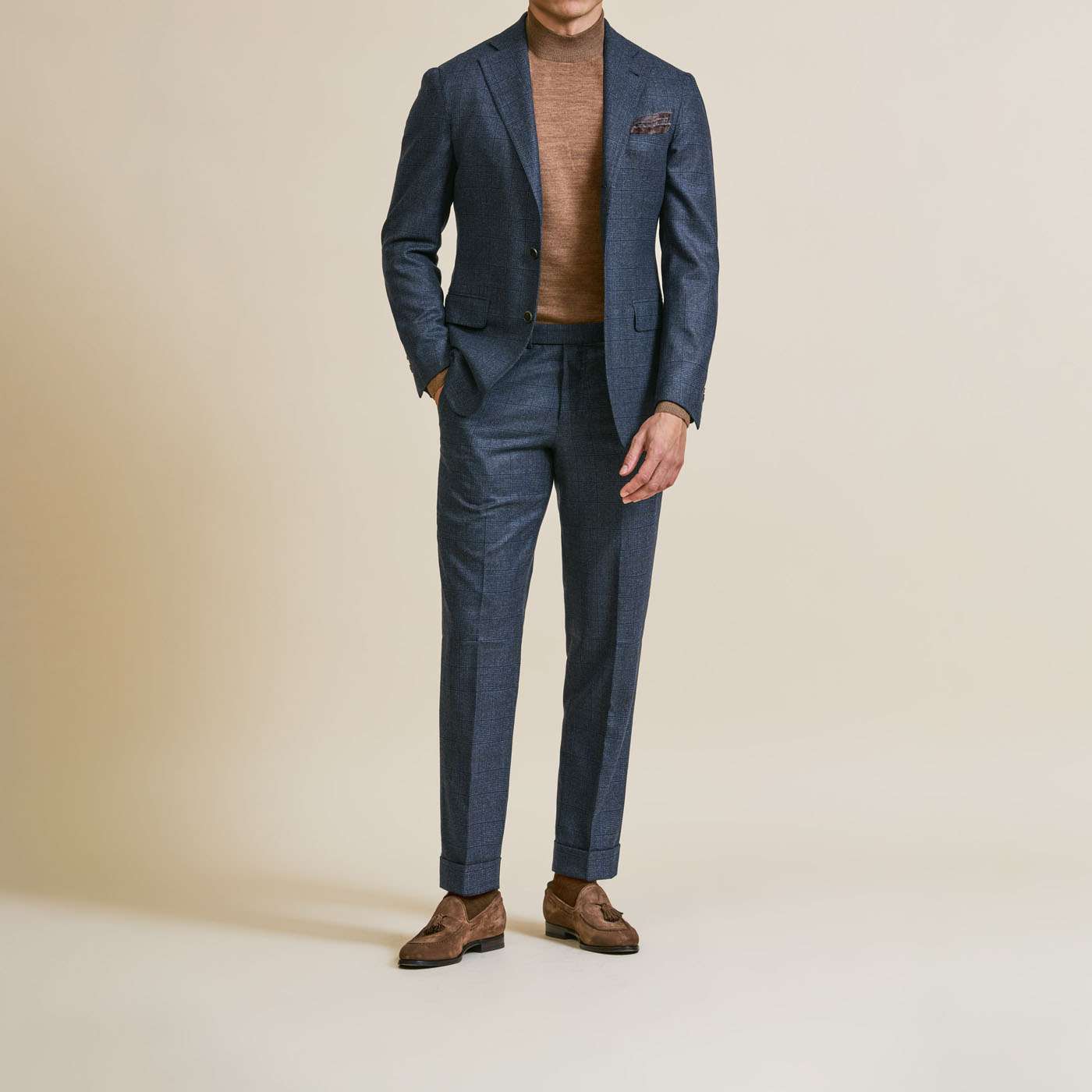 A Pearce Bespoke custom suit on a male model.