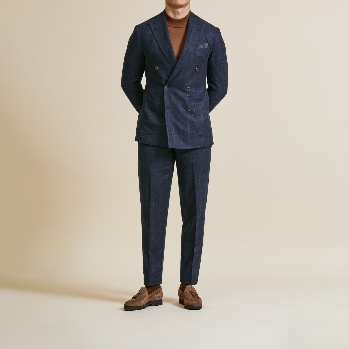 A Pearce Bespoke custom suit on a male model.
