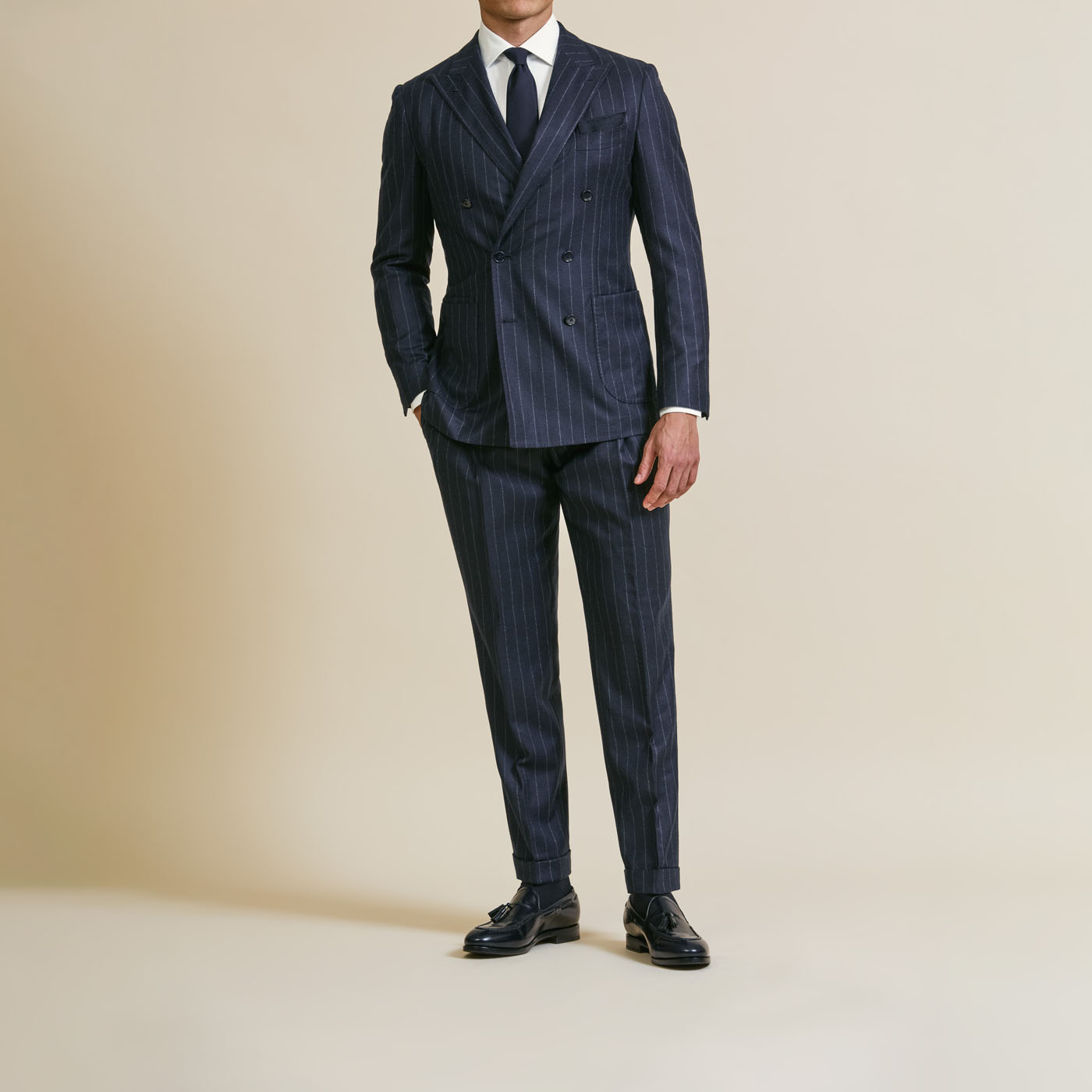 A Pearce Bespoke custom suit on a male model.