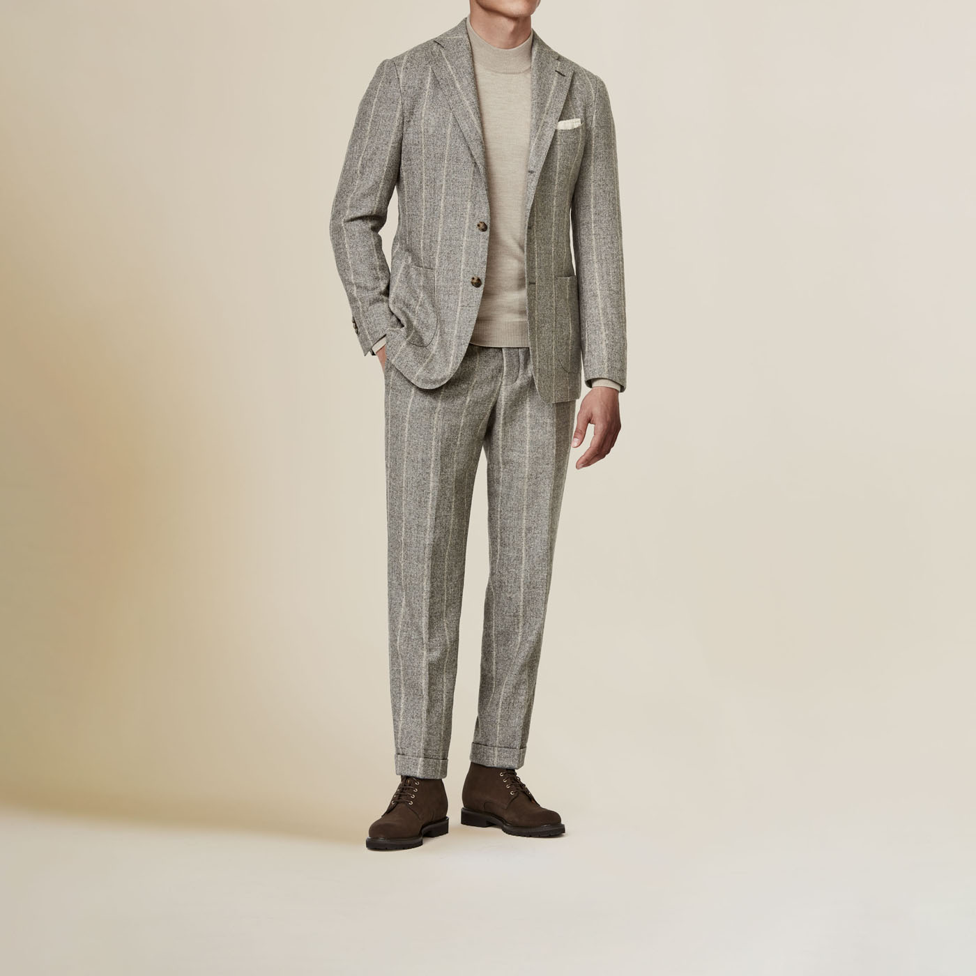 A Pearce Bespoke custom suit on a male model.
