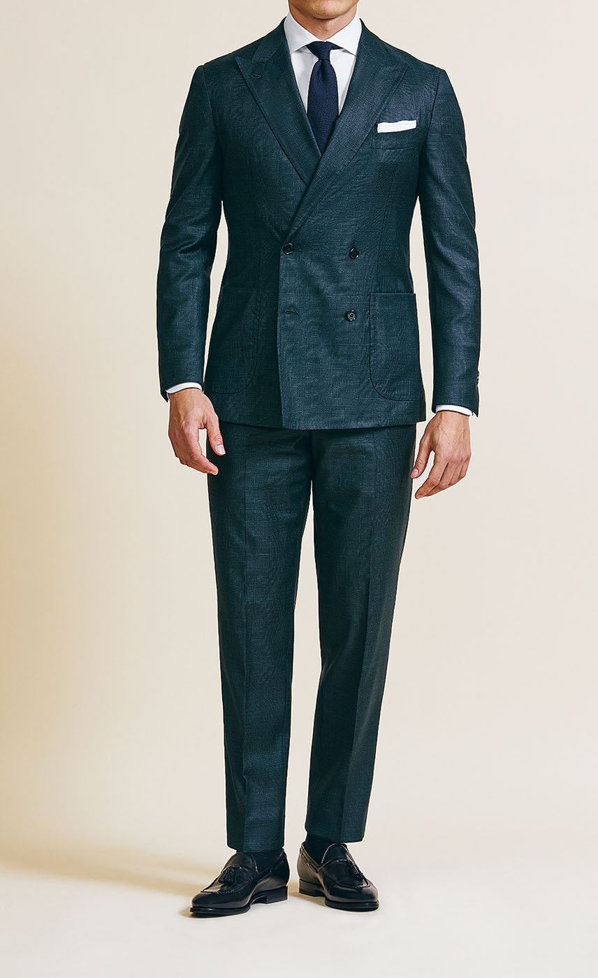 A Pearce Bespoke custom suit on a male model.