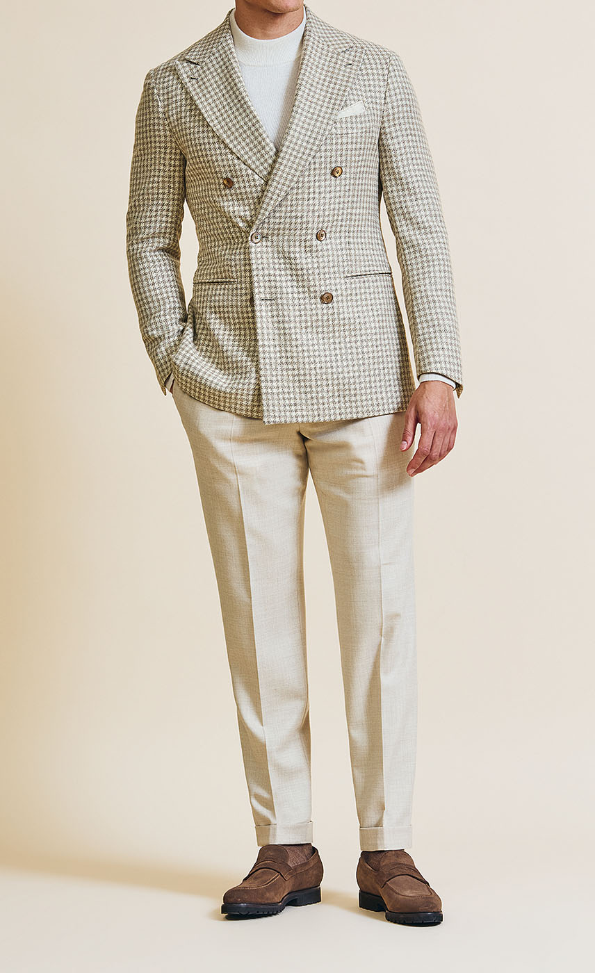 A Pearce Bespoke custom suit on a male model.