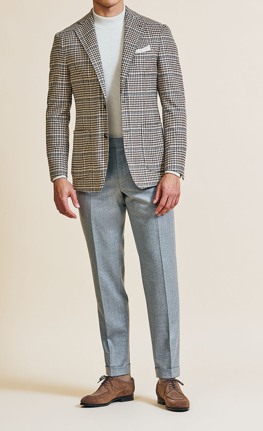 A Pearce Bespoke custom suit on a male model.