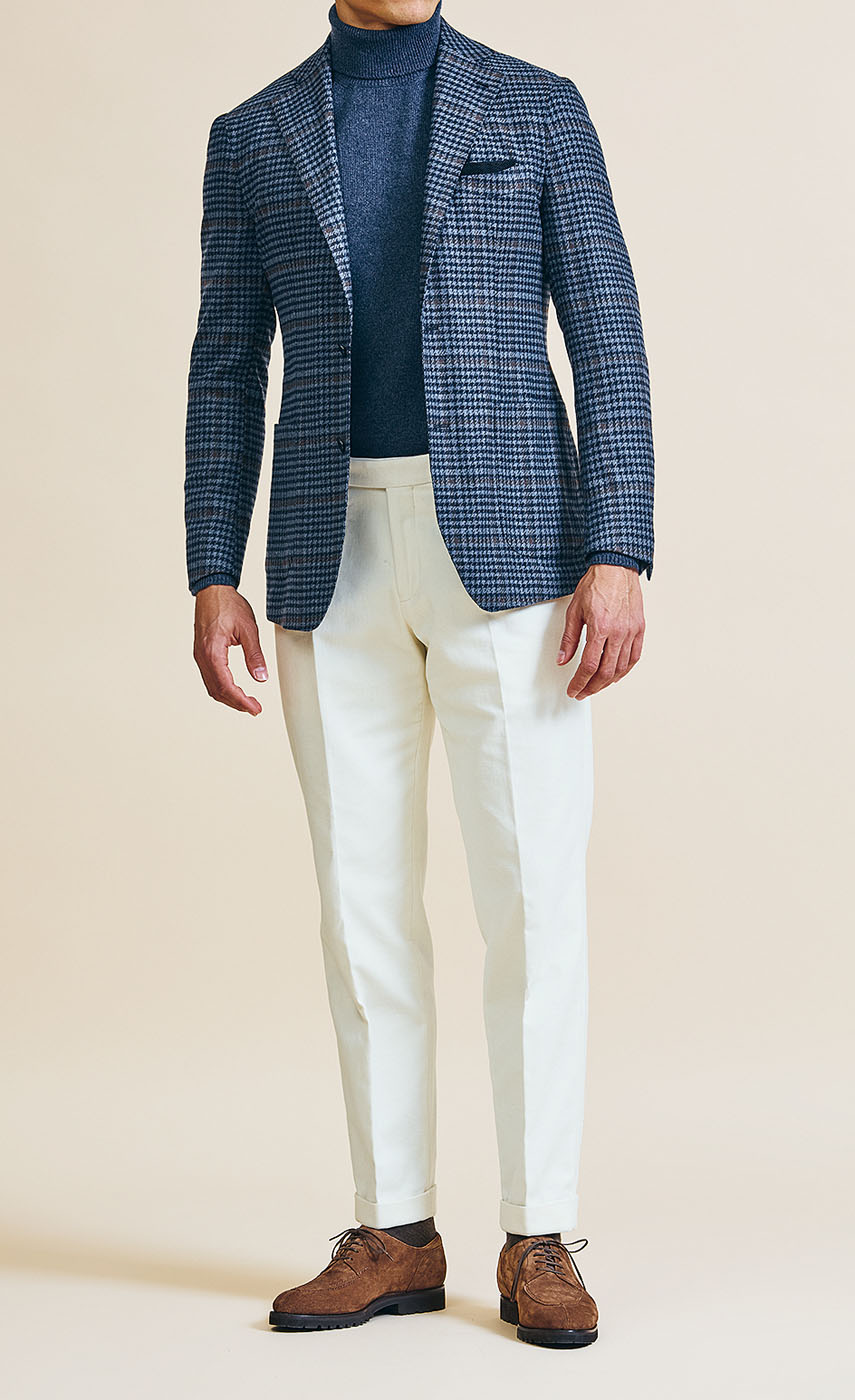 A Pearce Bespoke custom suit on a male model.