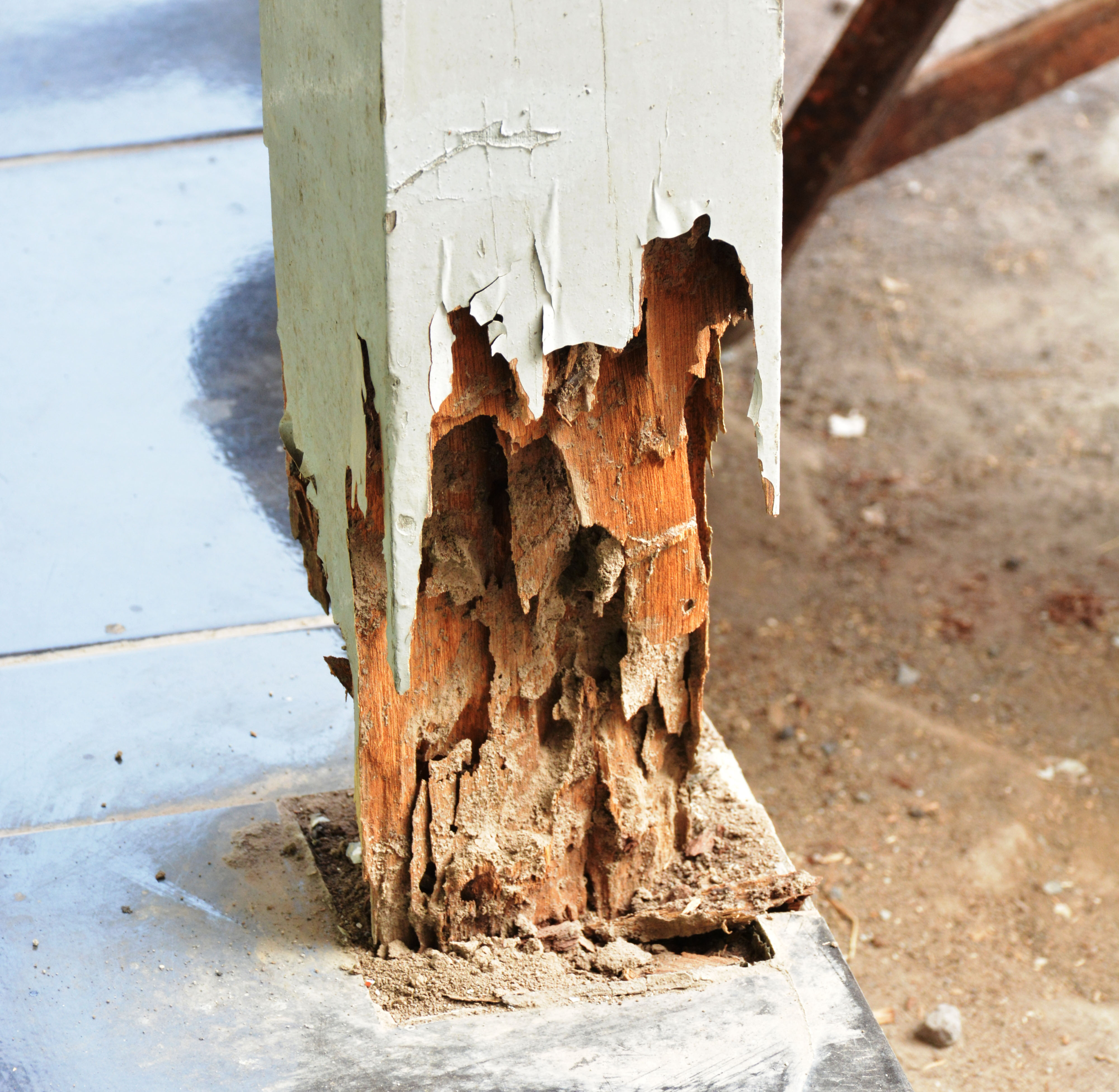 A residential pillar that has been compromised by termites - if you are struggling with termites, contact GGA, the best termite company in Waco, TX.