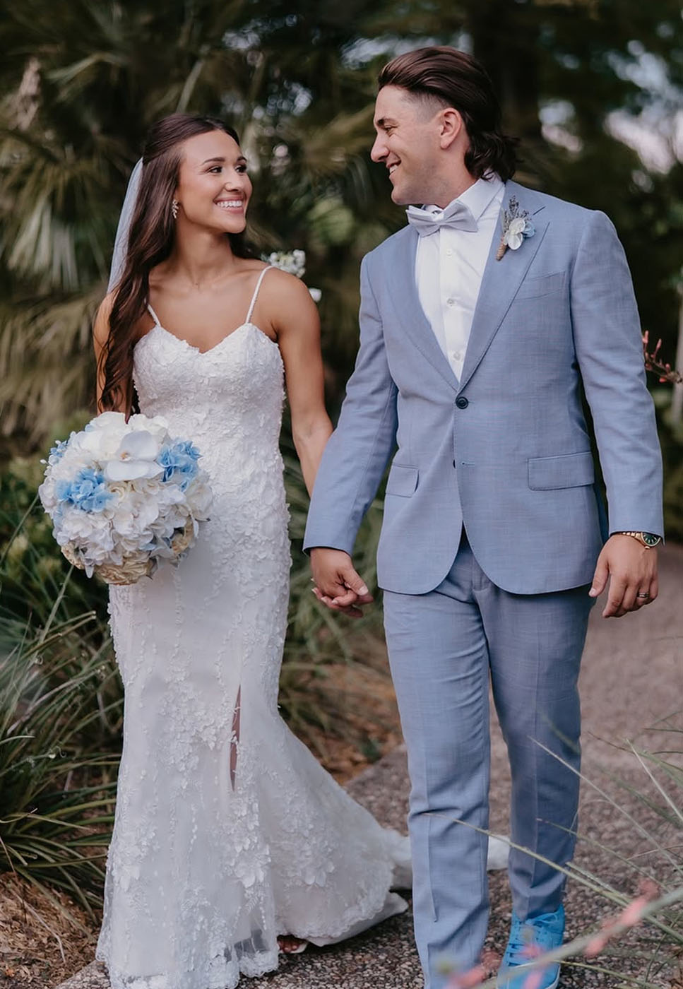 A bride and groom walking in your local area, {fran_state_abbrev}.